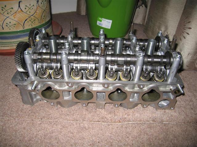 Beautiful s2000 cylinder head. Might have a light porting job done on it, Who does them? 